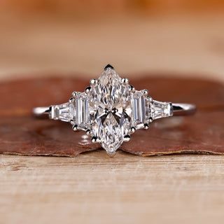 Marquise engagement ring with 5 stone diamond ring.