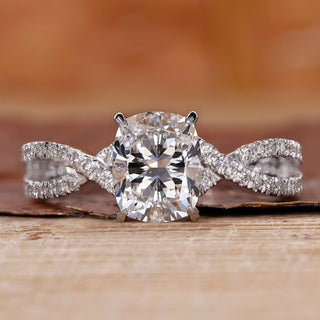 cushion cut engagement ring with twisted pave engagement ring.