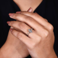 Round cut pave setting ring with 6 claw prong setting.