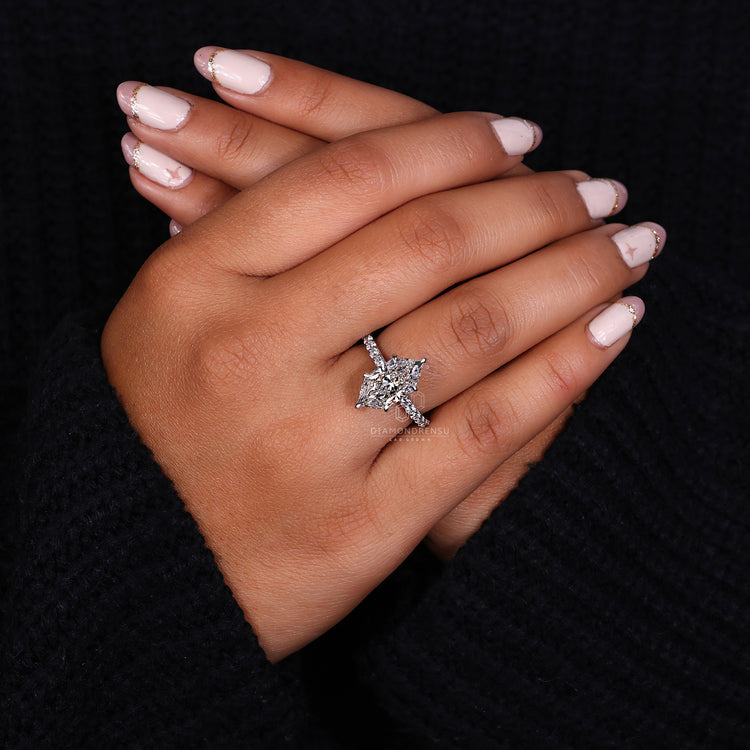 Round cut pave set ring with 6 claw prong setting.