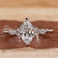 marquise diamond engagement ring in white gold finish.