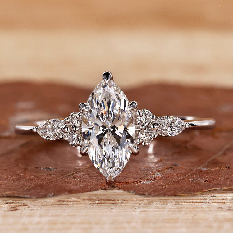 marquise diamond engagement ring in white gold finish.