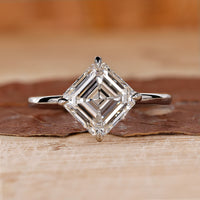 Asscher cut diamond ring with solitaire engagement ring.