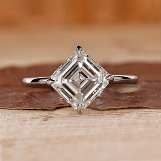Asscher cut diamond ring with solitaire engagement ring.