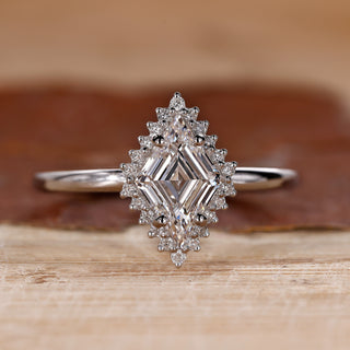 Halo diamond engagement ring with lozenge diamond engagement ring.