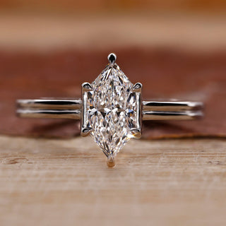 Dutch marquise engagement ring with dual shank setting.
