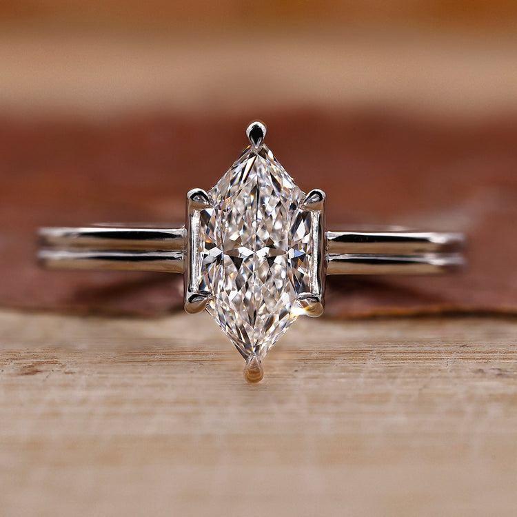 Dutch marquise engagement ring with dual shank setting.