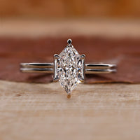 Dutch marquise engagement ring with dual shank setting.