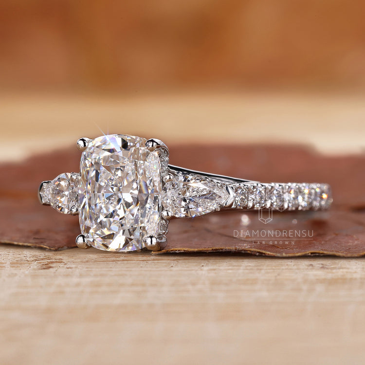 Hidden halo engagement ring in round diamond pave setting ring.