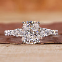 Elongated Cushion Cut Diamond Ring with 3 Stone engagement ring.