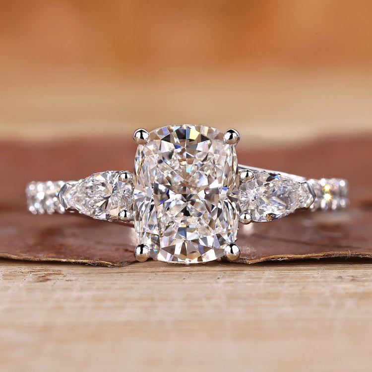 Elongated Cushion Cut Diamond Ring with 3 Stone engagement ring.