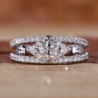 Marquise engagement ring with four claw prong setting.