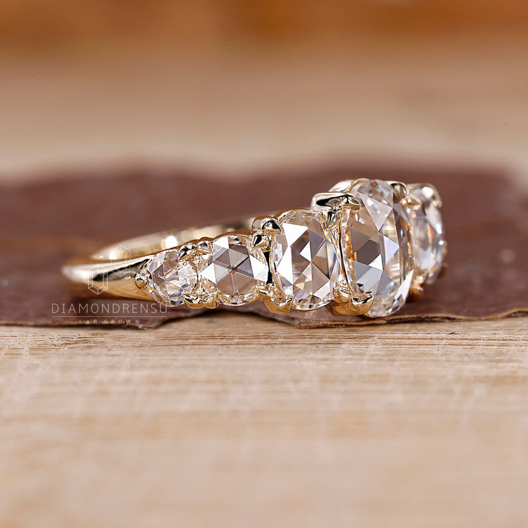 5 claw prong pear diamond engagement ring.
