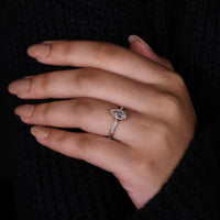 white gold engagement ring with 6 prong setting.