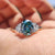 Stunning oval moissanite engagement ring with claw prongs on hand Stunning oval moissanite engagement ring with claw prongs on hand