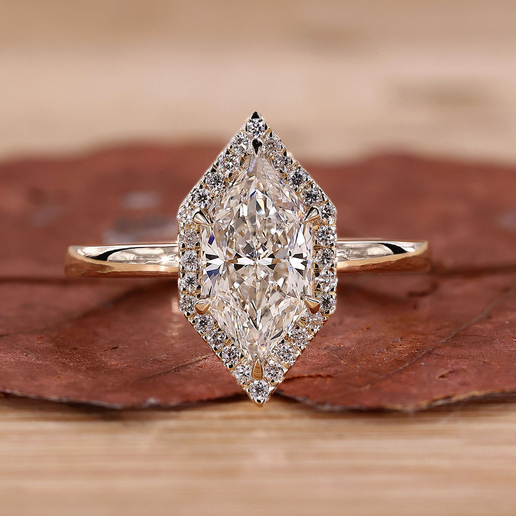 Dutch marquise ring with 6 claw prong setting.