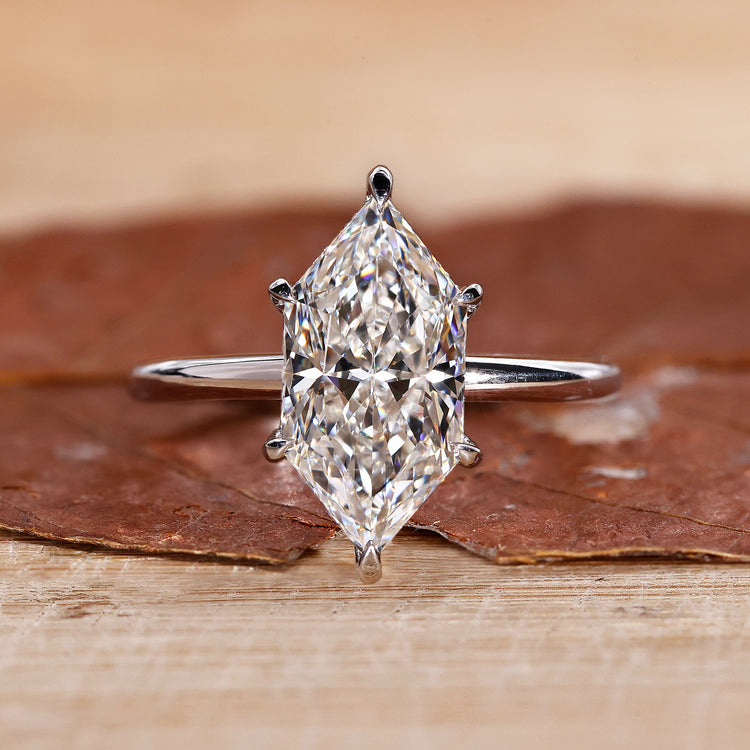 Dutch marquise engagement ring with hidden halo diamond ring.
