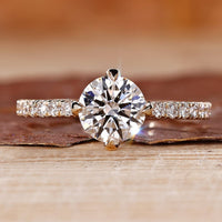 Yellow gold diamond ring with round cut diamond ring.