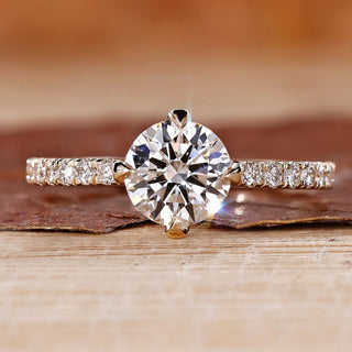 Yellow gold diamond ring with round cut diamond ring.