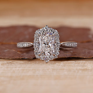 Radiant Engagement Ring with tapered shank and halo setting.