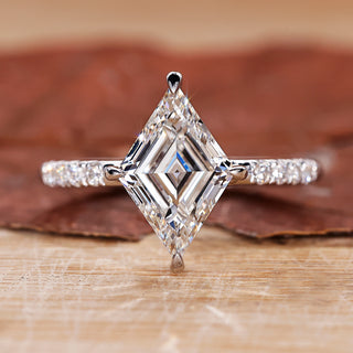 Pave setting ring with lozenge cut engagement ring style.