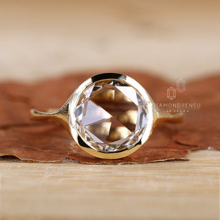 Round rose cut diamond ring set in a handmade setting.