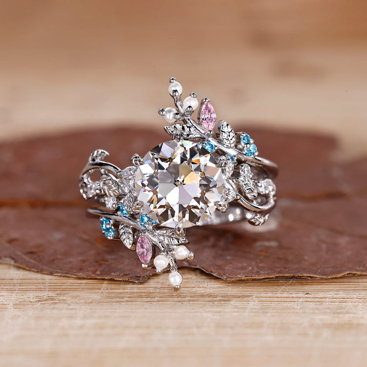 Nature Inspired Bridal Set with leaf style pave ring design.