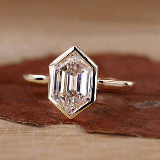 Hexagon engagement ring with yellow gold engagement ring.