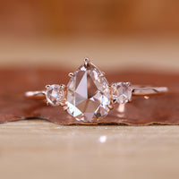 Three Stone Diamond Ring with pear rose cut diamond ring.