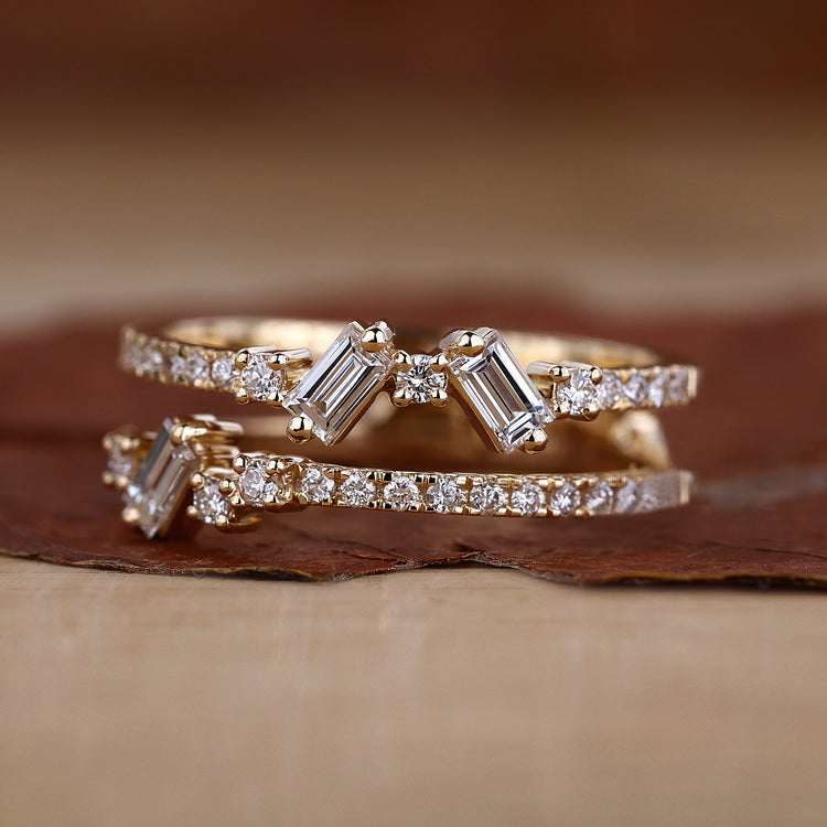 Baguette diamond wedding band with cluster diamond band.