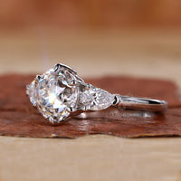 6 claw prong ring holding a centre diamond with secure symmetry and sleek profile.
