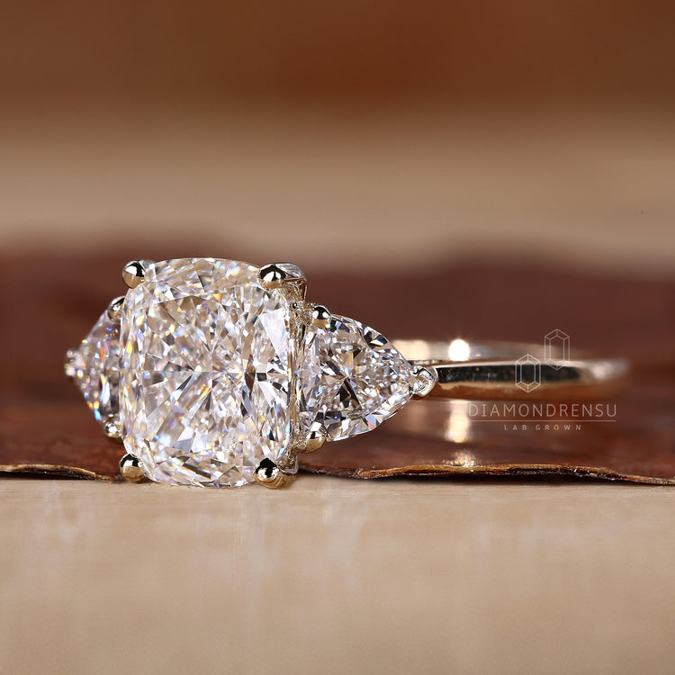 Tapreded shank ring crafted in yellow gold ring.