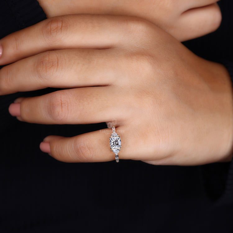 IGI certified cushion cut with trillion side stones.