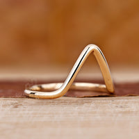 V shaped wedding band in gold.