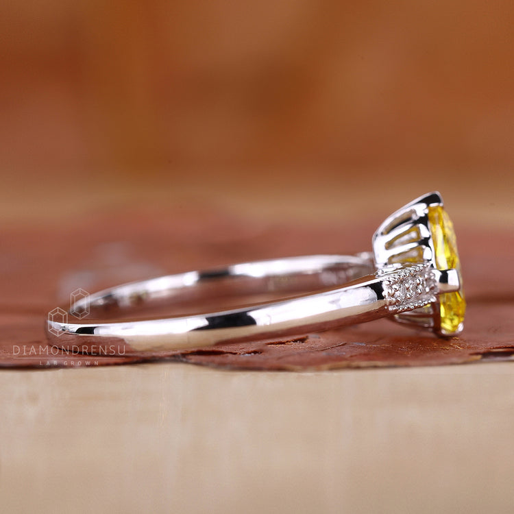 White gold diamond ring with pear diamond ring.