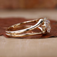 Compass prong setting on cushion old mine cut ring.