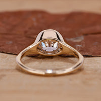 Buy Engagement ring made with bezel set ring.