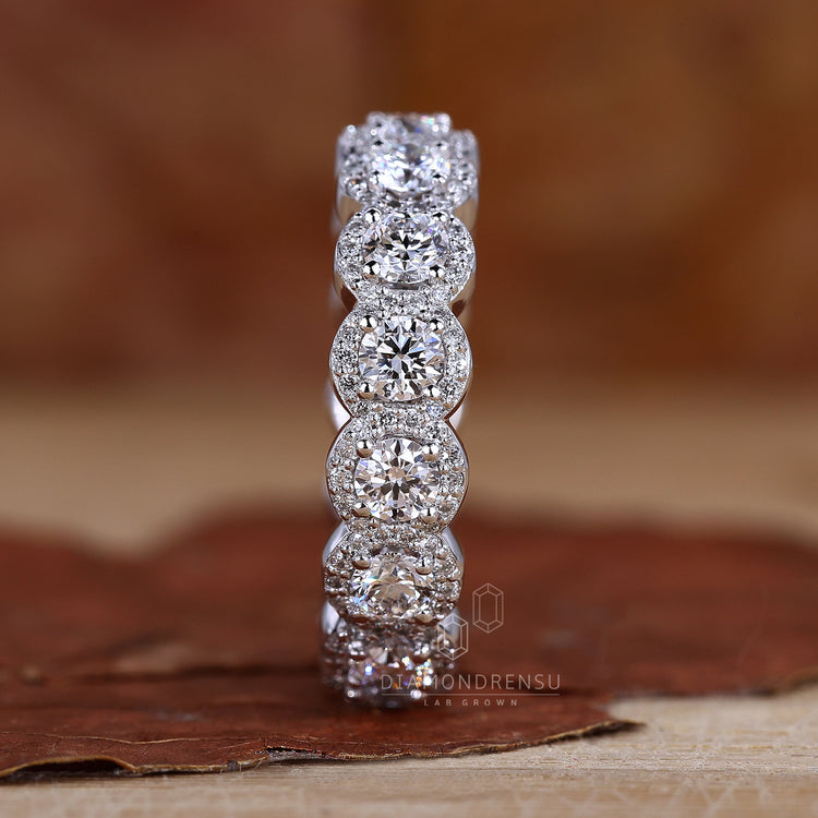 Custom diamond band in halo wedding band.