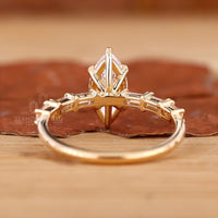 Buy engagement ring featuring baguette pavé and prong setting.