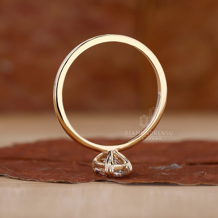 Double prong setting ring holds diamonds securely.