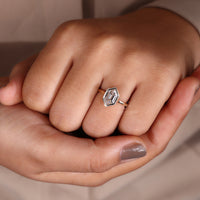 Bezel set diamond ring in hexagon engagement ring.
