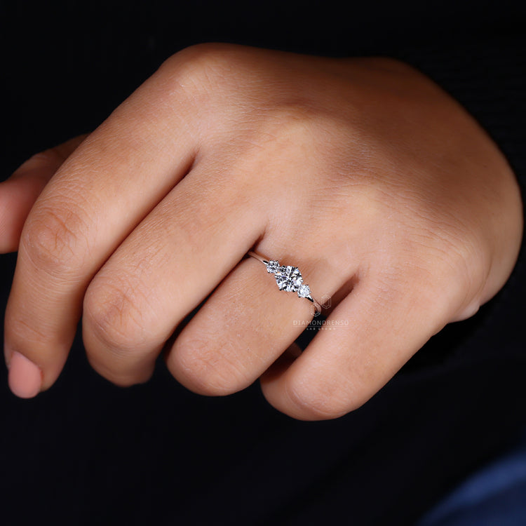 Six claw prong ring holding diamonds with security and style.