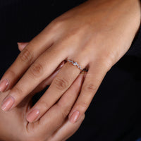 Minimalist engagement ring with clean lines and soft curves.