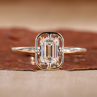 Emerald cut engagement ring with solitaire engagement ring.