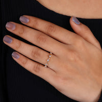 Distance pave band on yellow gold wedding band.
