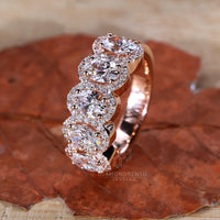 rose gold engagement ring with halo setting.