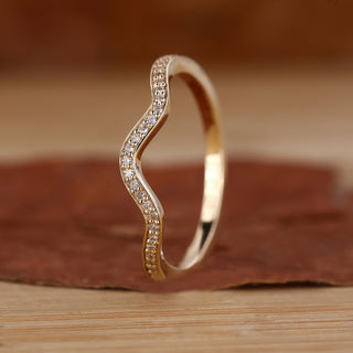 Stackable eternity band with wave eternity band.