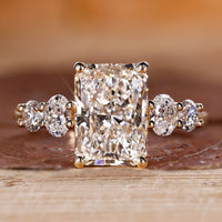Radiant diamond engagement ring with 5 stone engagement ring.