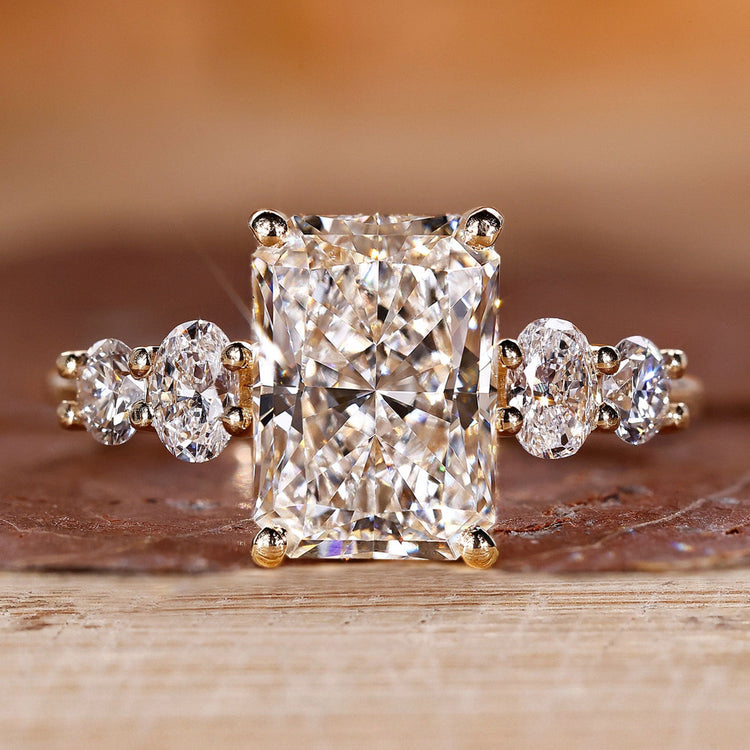 Radiant diamond engagement ring with 5 stone engagement ring.
