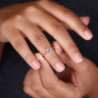 hexagon step cut diamond ring in tapered shank design.